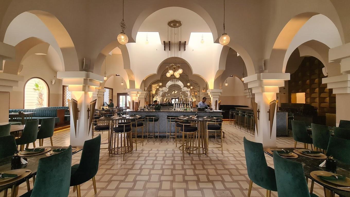 Mezze spread and courtyard seating at Mer Bey El Gouna