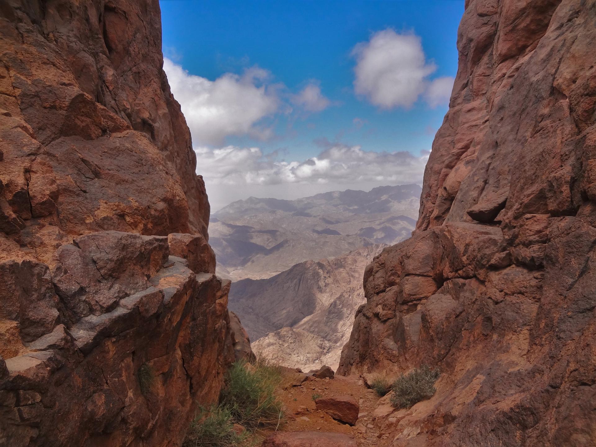 Wide open desert valley panorama seen from the Jebel Bab El Donya summit in South Sinai