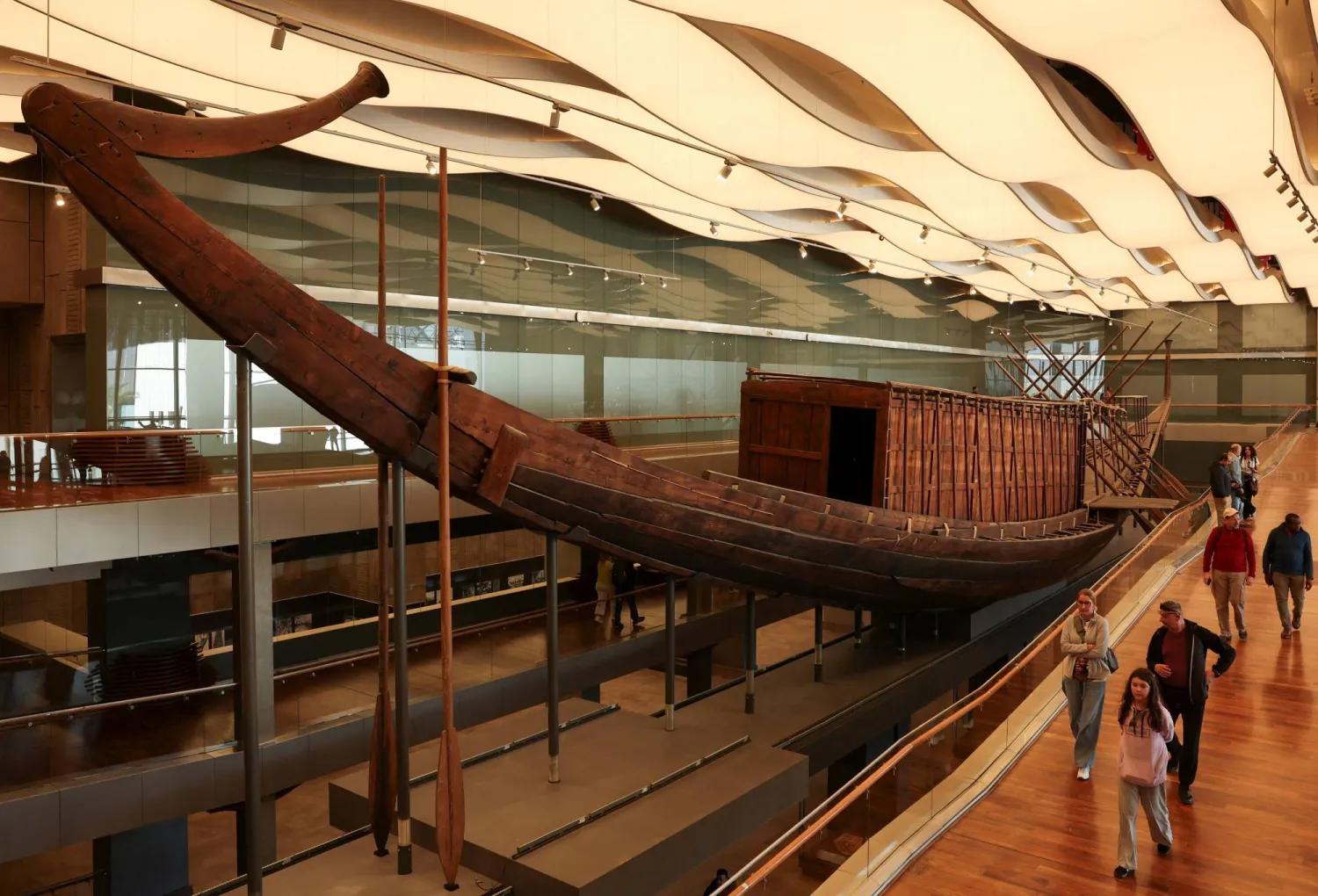 The 43-metre Khufu Solar Boat reconstructed and displayed inside the Grand Egyptian Museum