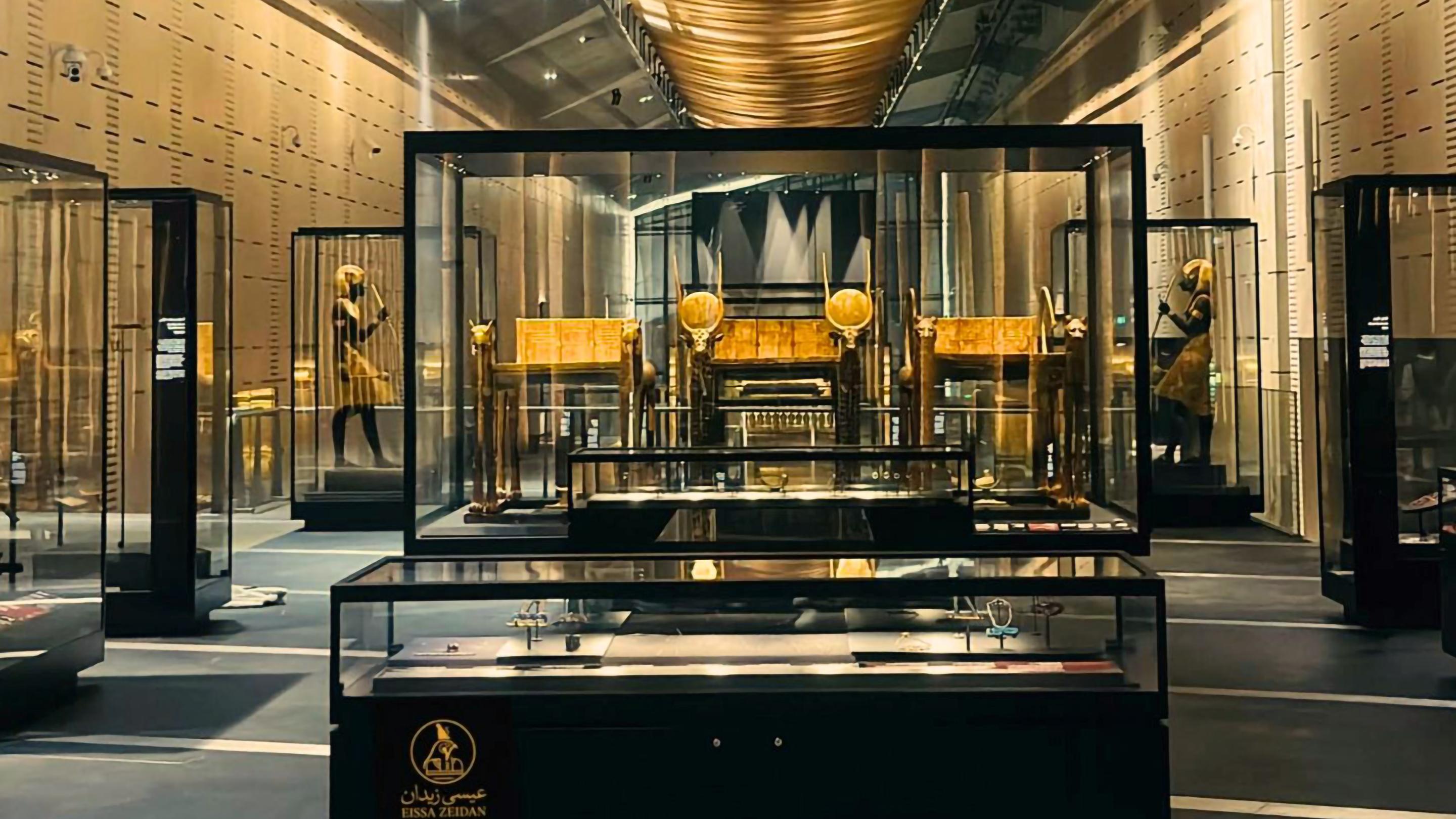 Tutankhamun golden death mask displayed in the Grand Egyptian Museum galleries