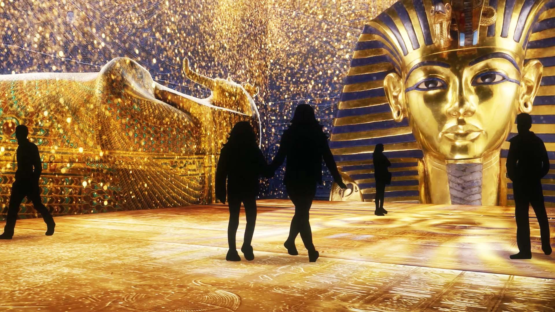 Visitor using a VR headset at an experience station inside the Grand Egyptian Museum