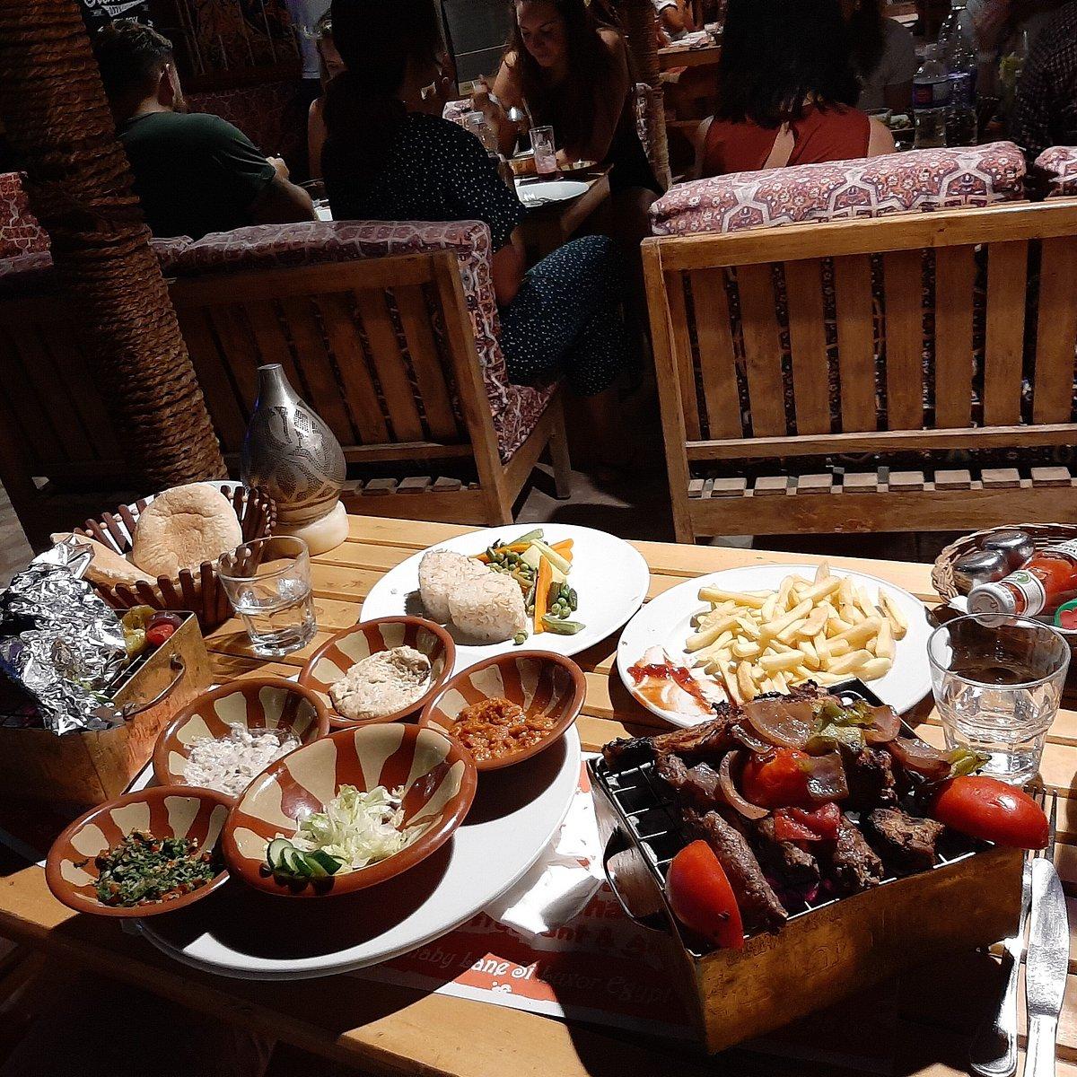 Traditional Egyptian food served at Al Sahaby Lane Restaurant in Luxor.