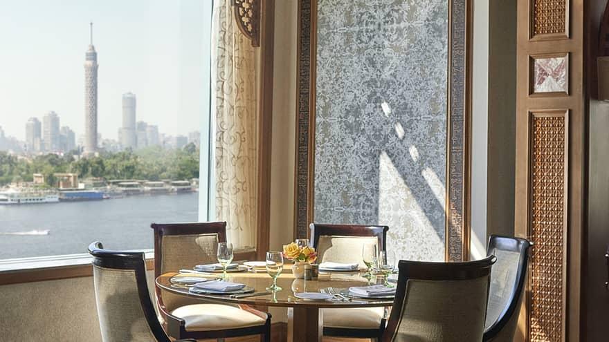Zitouni Egyptian restaurant at Four Seasons Cairo Nile Plaza with Nile terrace view at sunset