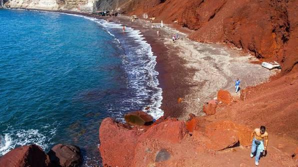 Red volcanic cliffs and beach at Red Beach, Santorini