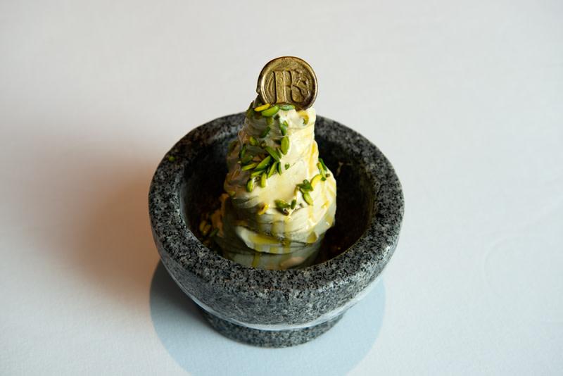 Pistachio ice cream drizzled with olive oil at Roberto’s restaurant in Dubai.